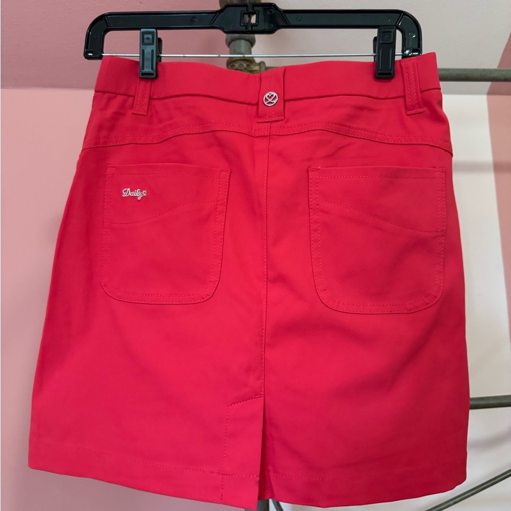 Cute lyric skort!  Reddish/pink in color. Size 2 - Picture 2 of 3